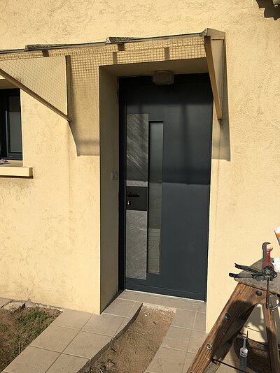 Porte d’entrée en aluminium